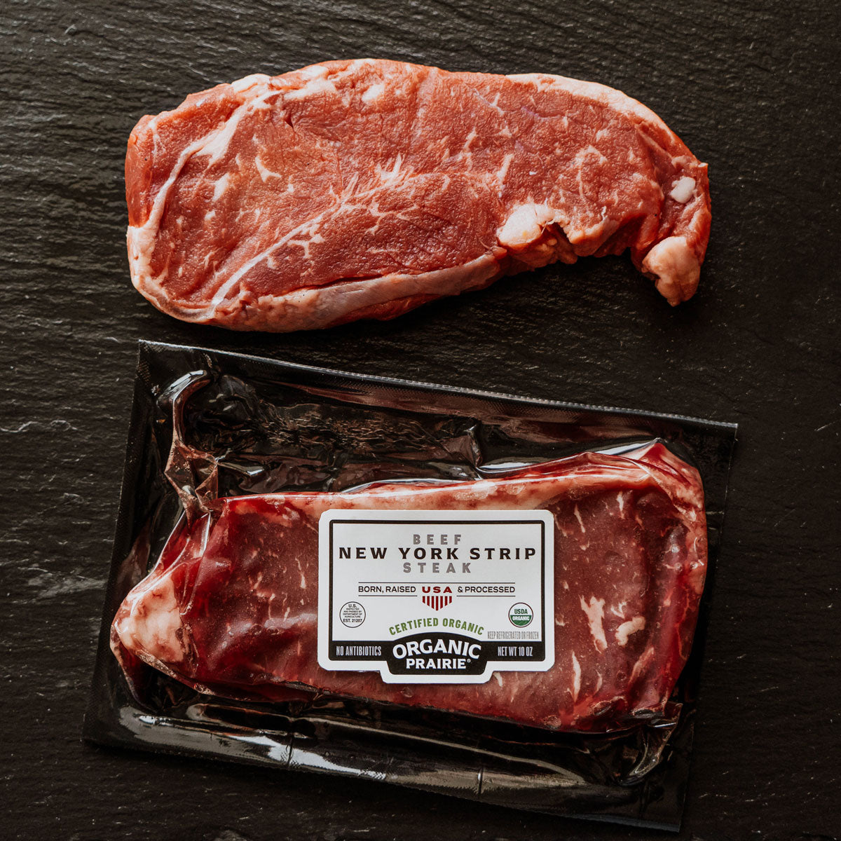 organic new york strip raw, both in and out of packaging