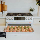 organic ground beef as meatballs on a tray